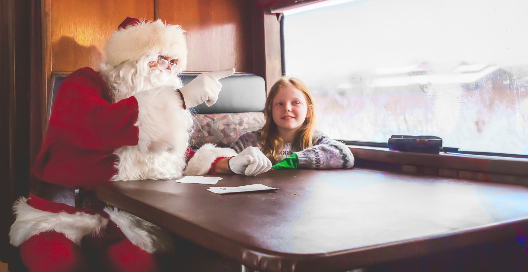 Santa on Warm Train with Child Santa on Warm Train with Child